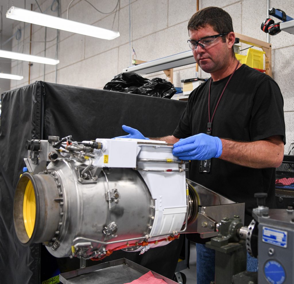 Chris Gardner, 309th Commodities Maintenance Group, works on an F-16 fuel system assembly at Hill Air Force Base, Utah, April 27, 2020. The 309th CMXG, one of seven groups in the Ogden Air Logistics Complex, is the technical repair center for landing gear, wheels, brakes, secondary power systems, hydraulics, pneudraulics, and composites. (U.S. Air Force photo by R. Nial Bradshaw)